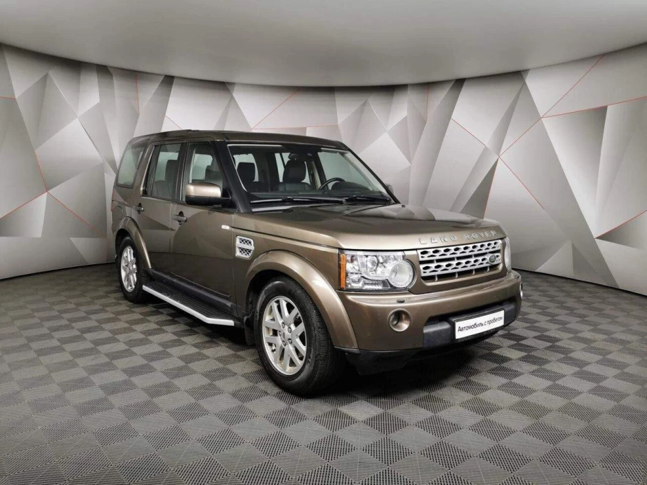 Ленд Ровер Дискавери 2012. Дискавери 2012 года. Land Rover Discovery IV 2.7D at (190 л.с.) серый с пробегом на снегу.