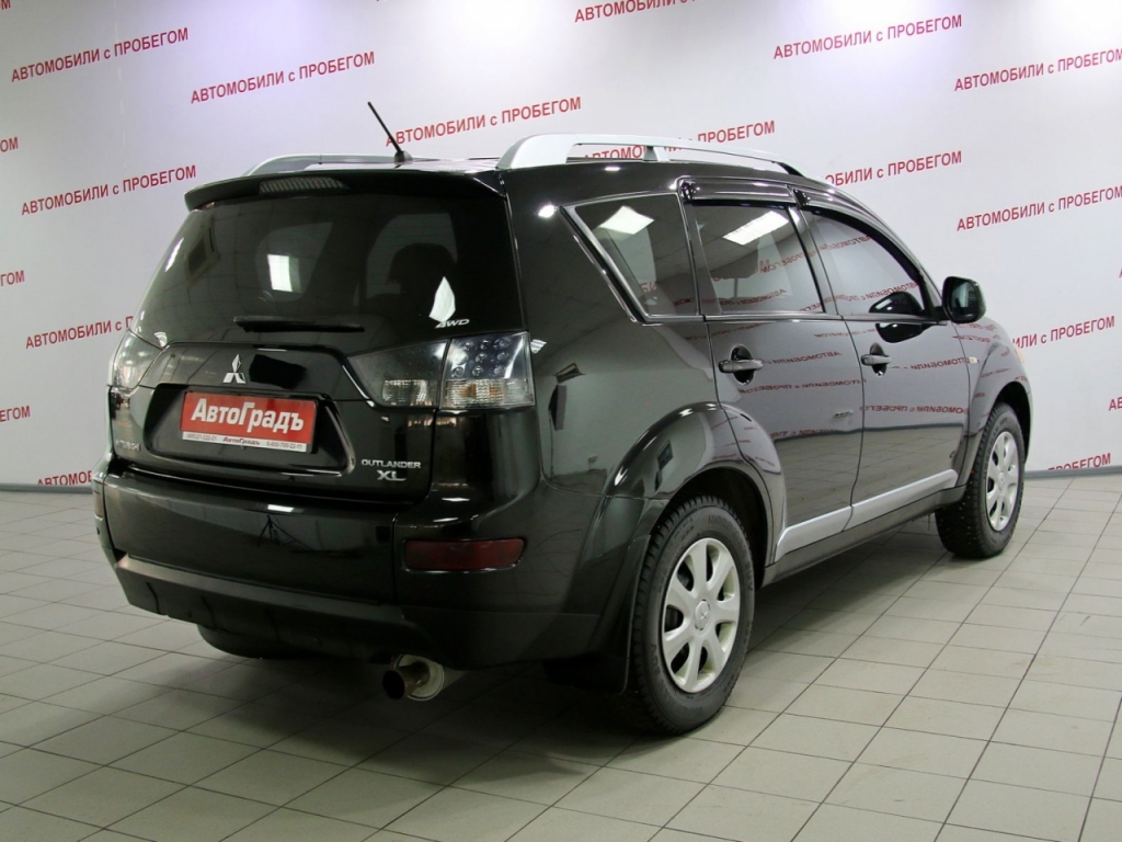 Автоград автомобили отзывы покупателей. Mitsubishi Outlander 2011 серый.