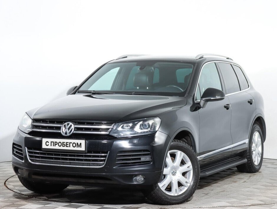 Фольксваген бу отзывы. Volkswagen Touareg 2014 серебристый. Фольксваген внедорожник.