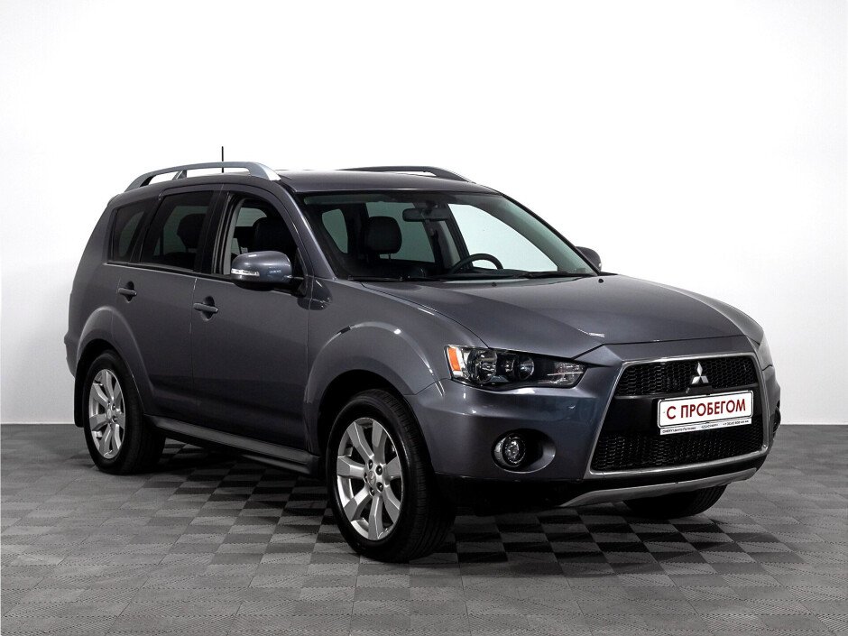 Mitsubishi Outlander 2011. Митсубиси Аутлендер 2011 характеристики. Митсубиси коричневый. Аутлендер 2011 технические характеристики.