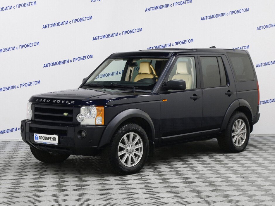 Land Rover Discovery IV 2.7D at (190 л.с.) серый с пробегом на снегу.