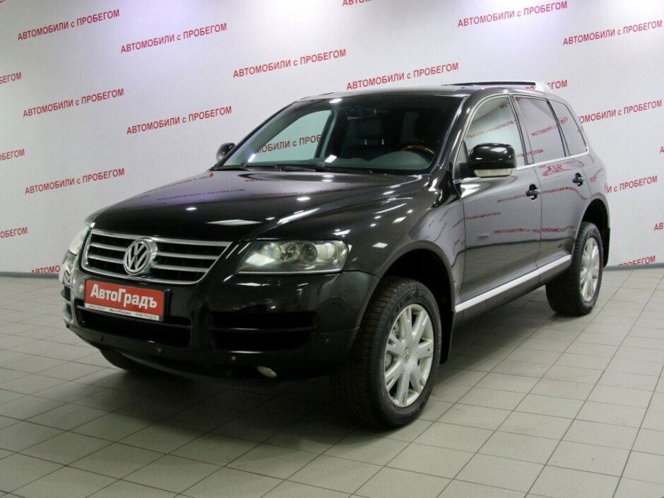 Volkswagen Touareg 1 черный. Фольксваген Туарег 2006.