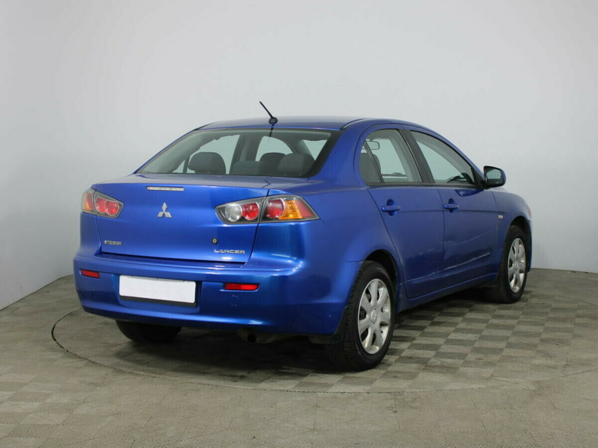 Купить Mitsubishi Lancer 1.6 AT (117 л.с.) 2013 года в Красноярске |  Продажа Мицубиси Лансер за 679 000 руб. БУ в кредит в «Автосалон124»